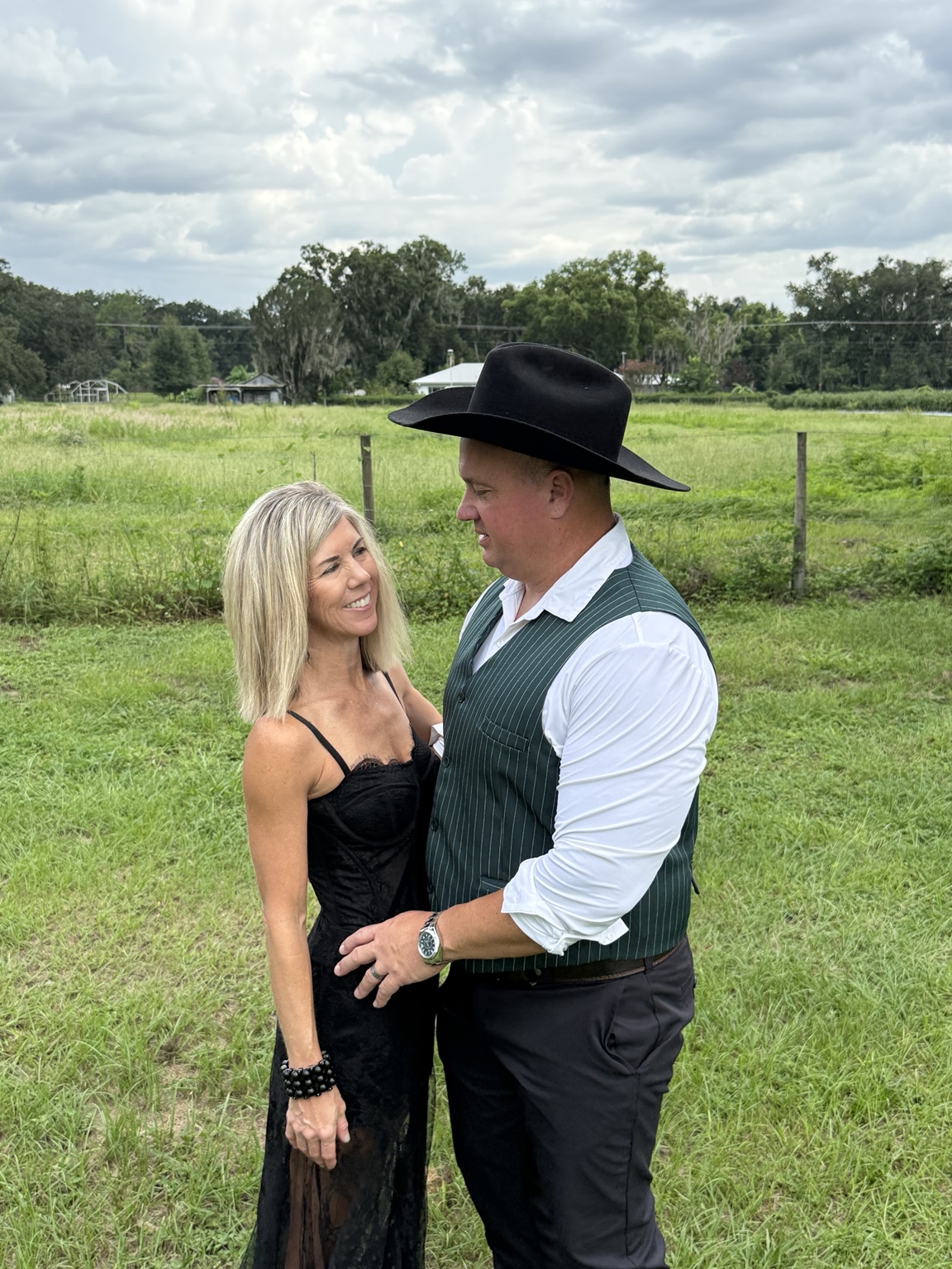 A favorite family moment outdoors, wearing a cowboy hat and sharing a smile
